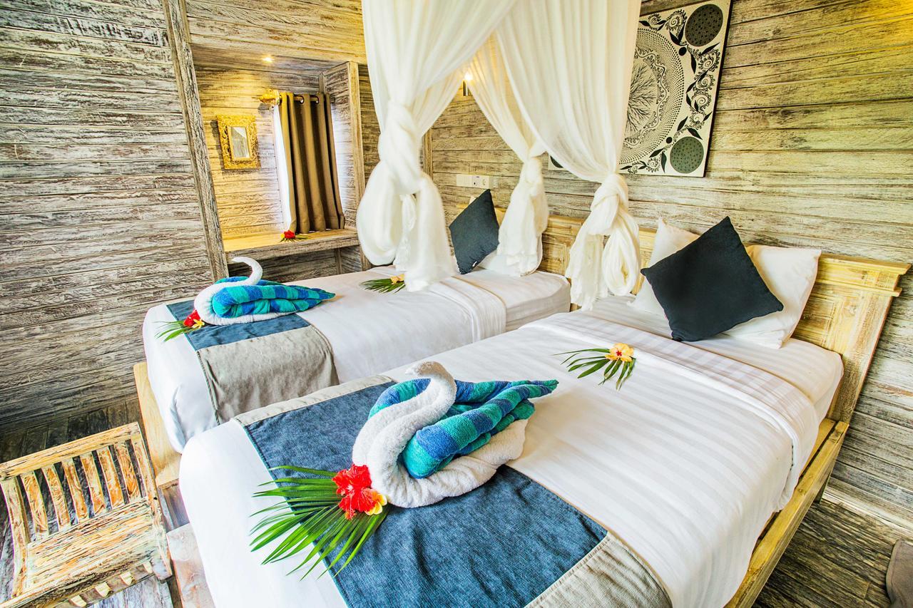 Отель The Syron Huts Lembongan Экстерьер фото